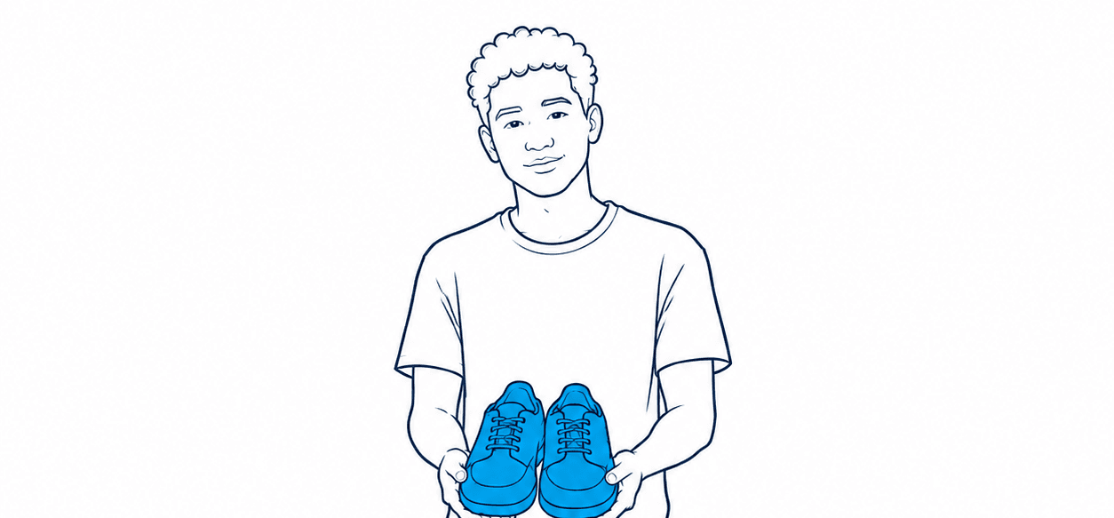 Illustration — a pair of school shoes set down on a Cape Town street